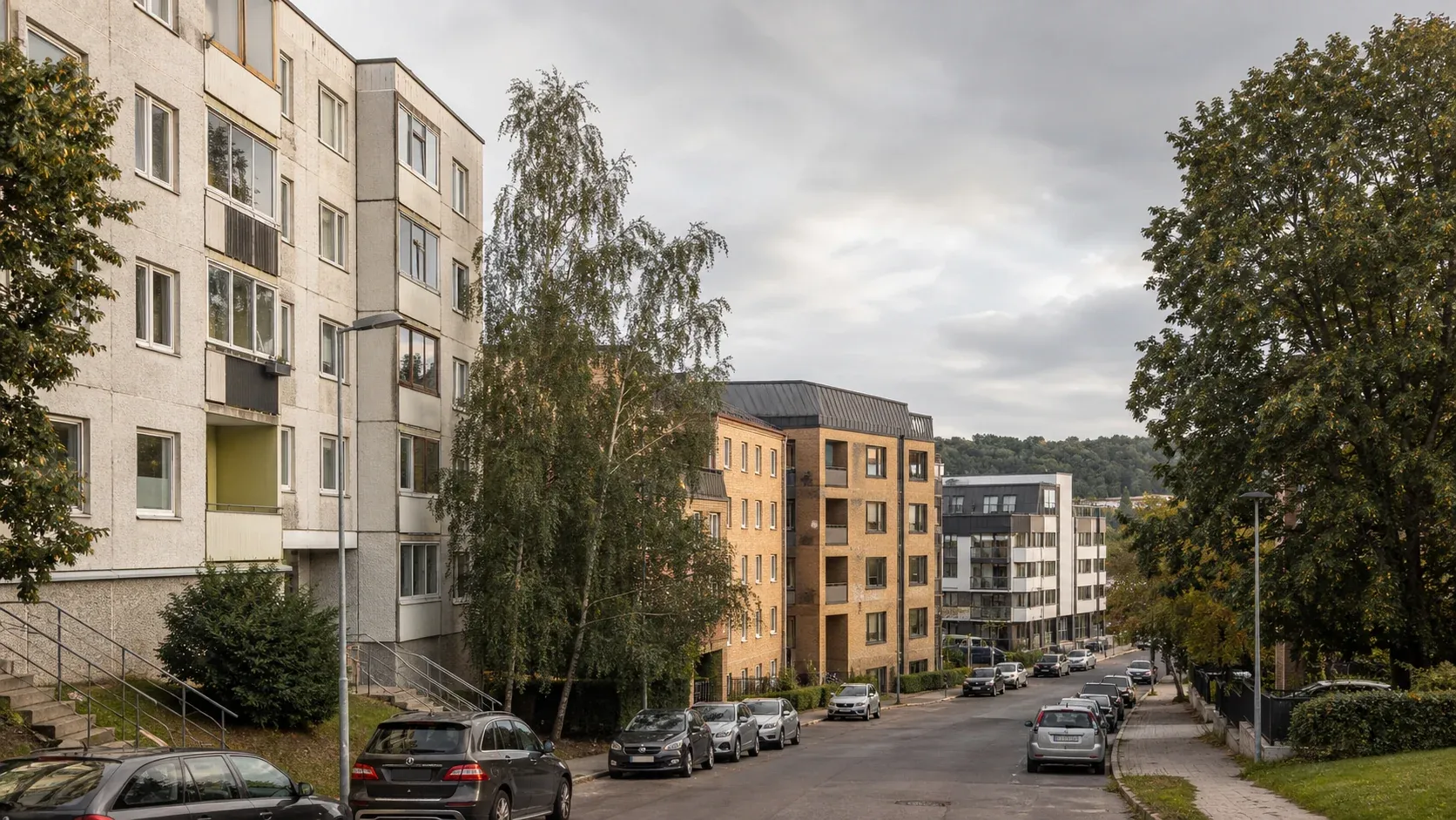 Skirtingų laikotarpių daugiabučiai Lietuvos miesto gyvenamajame rajone